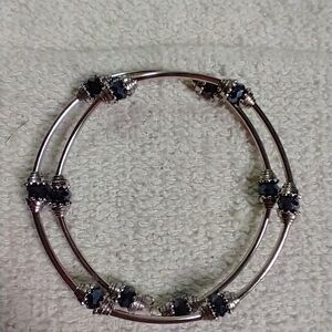 Silvertone dark blue beaded wire bracelet